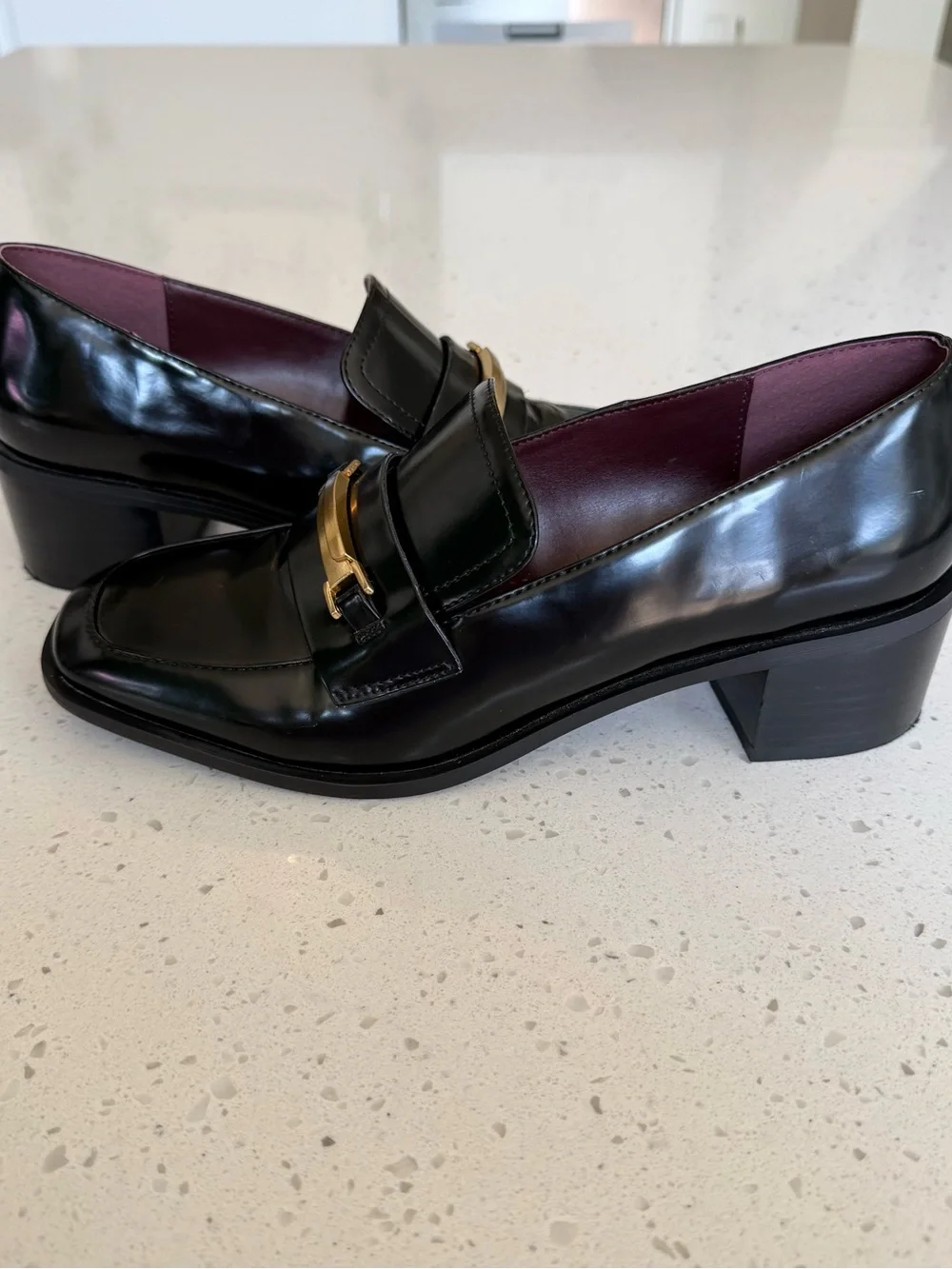 Franco Sarto Black Leather Loafers with Gold Hardware